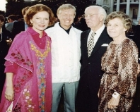 A group of people posing for a photo

AI-generated content may be incorrect.